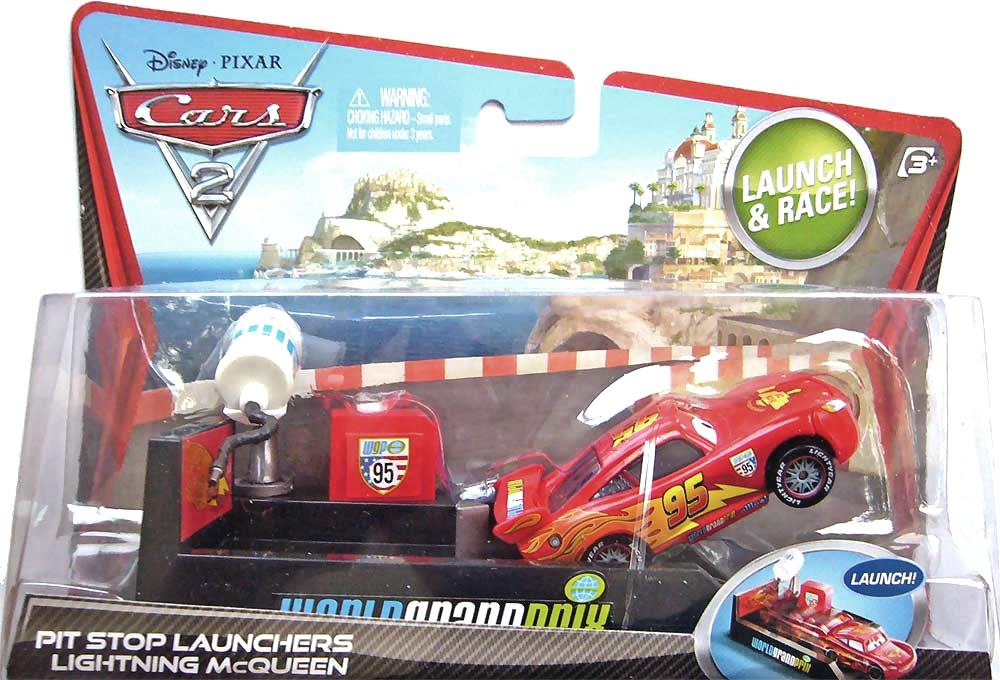 Lightning McQueen with Racing Wheels - Pit Row Launcher — Mattel V3660 die-cast
